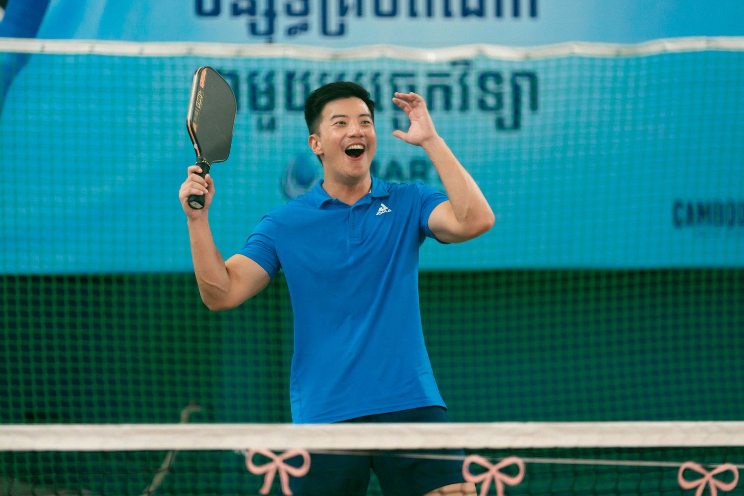 A player celebrating match point
